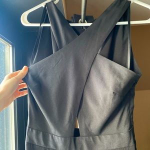 BEBE criss cross front halter black jumpsuit